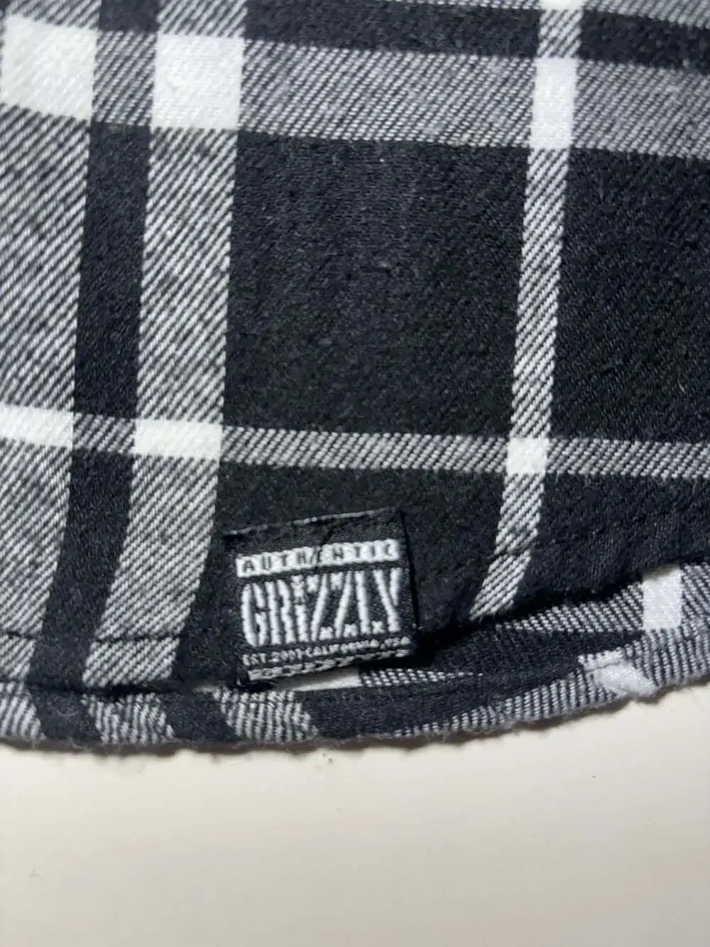Grizzly Griptape Men's Black and White Plaid Button-Up Flannel Shirt